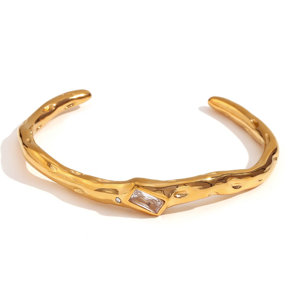Bracelet en acier inoxydable plaqué or 18 carats avec zircons